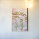 Pink and Gold Abstract I by Yvette St. Amant. shown as a paper print in a natural frame. Available as a archival giclee rolled canvas, fine art paper, or poster print. SKU 90983h.