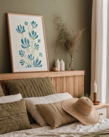 Pretty Blooms III by Yvette St. Amant. shown as a paper print in a natural frame. Available as a archival giclee rolled canvas, fine art paper, or poster print. SKU 103228h.