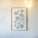 Pretty Blooms III by Yvette St. Amant. shown as a paper print in a natural frame. Available as a archival giclee rolled canvas, fine art paper, or poster print. SKU 103228h.