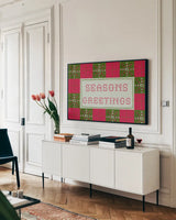 Quilted Christmas II by Yvette St. Amant. shown as a framed stretched canvas in a living room above a console. Available as a archival giclee rolled canvas, fine art paper, or poster print. SKU 102825i.