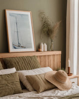 Sail on the Horizon by Yvette St. Amant. shown as a paper print in a natural frame. Available as a archival giclee rolled canvas, fine art paper, or poster print. SKU 88279h.