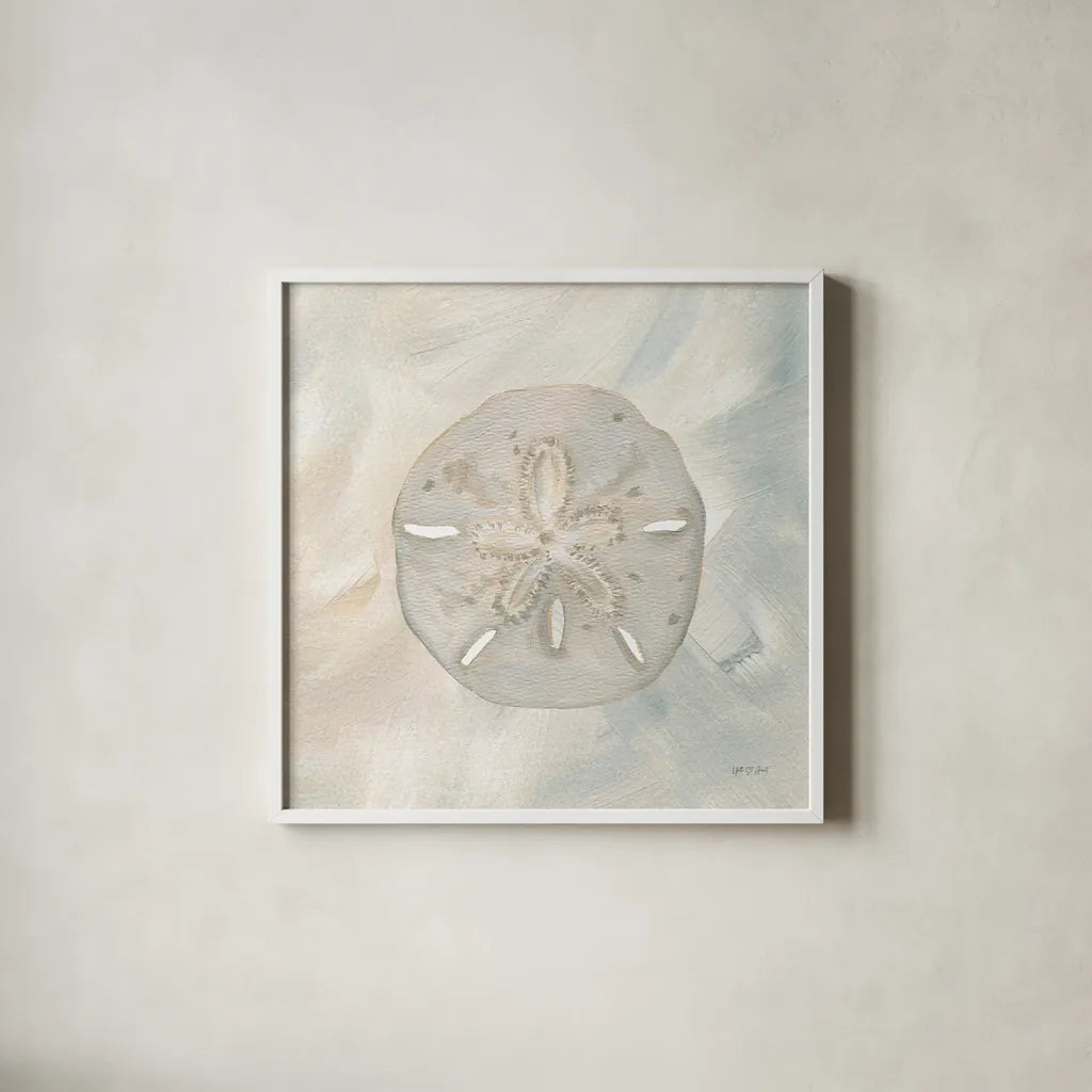 Sandollar I by Yvette St. Amant. Shown in a crisp white glass frame for a clean and minimalist style. Available as an archival giclee rolled canvas, fine art paper, or poster print. SKU 88517a.