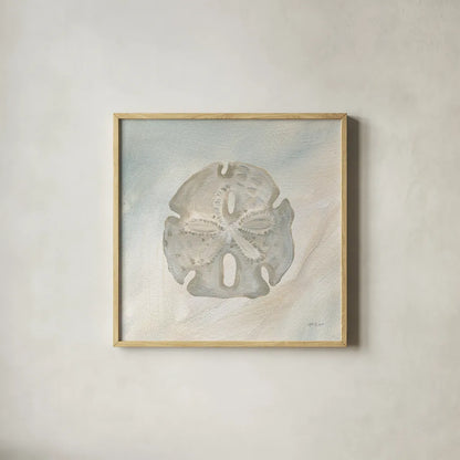 Sandollar II by Yvette St. Amant. Shown in a natural wood glass frame for a timeless modern aesthetic. Available as an archival giclee rolled canvas, fine art paper, or poster print. SKU 88518a.