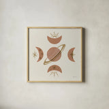 Serene Saturn and Moons by Yvette St. Amant. Shown in a natural wood glass frame for a timeless modern aesthetic. Available as an archival giclee rolled canvas, fine art paper, or poster print. SKU 91056a.