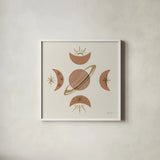 Serene Saturn and Moons by Yvette St. Amant. Shown in a crisp white glass frame for a clean and minimalist style. Available as an archival giclee rolled canvas, fine art paper, or poster print. SKU 91056a.