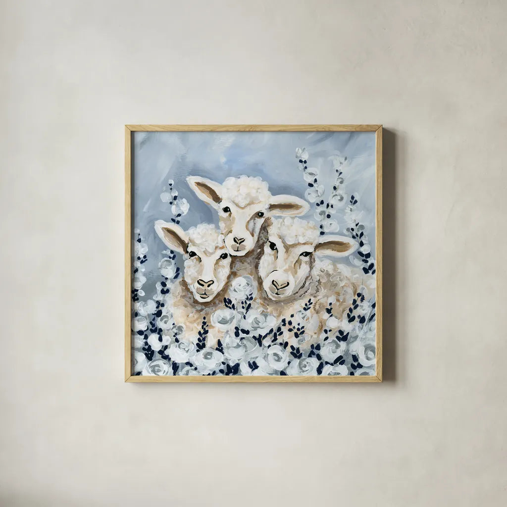 Sheep in the Meadow by Yvette St. Amant. Shown in a natural wood glass frame for a timeless modern aesthetic. Available as an archival giclee rolled canvas, fine art paper, or poster print. SKU 89495a.