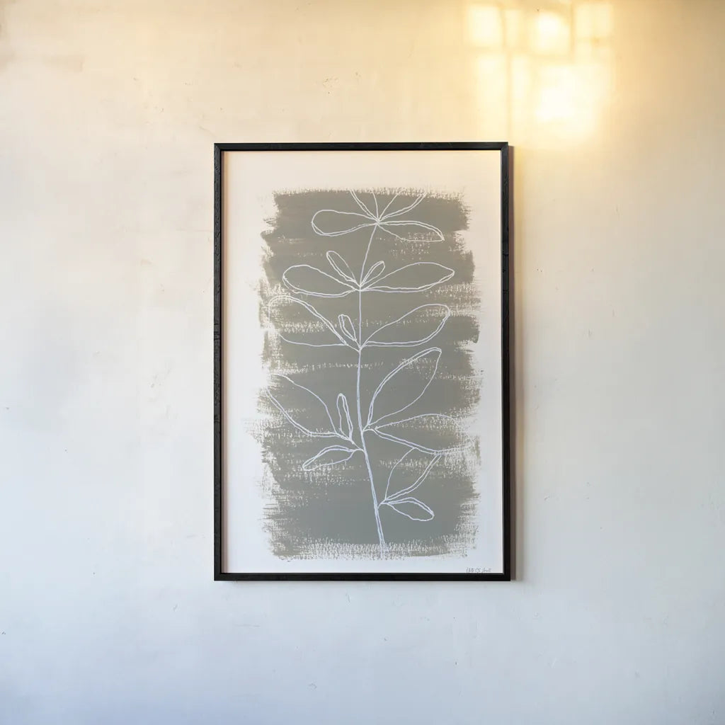 Simple Sprigs of Basil by Yvette St. Amant. shown as a paper print in a black flame. Available as a archival giclee rolled canvas, fine art paper, or poster print. SKU 93602h.