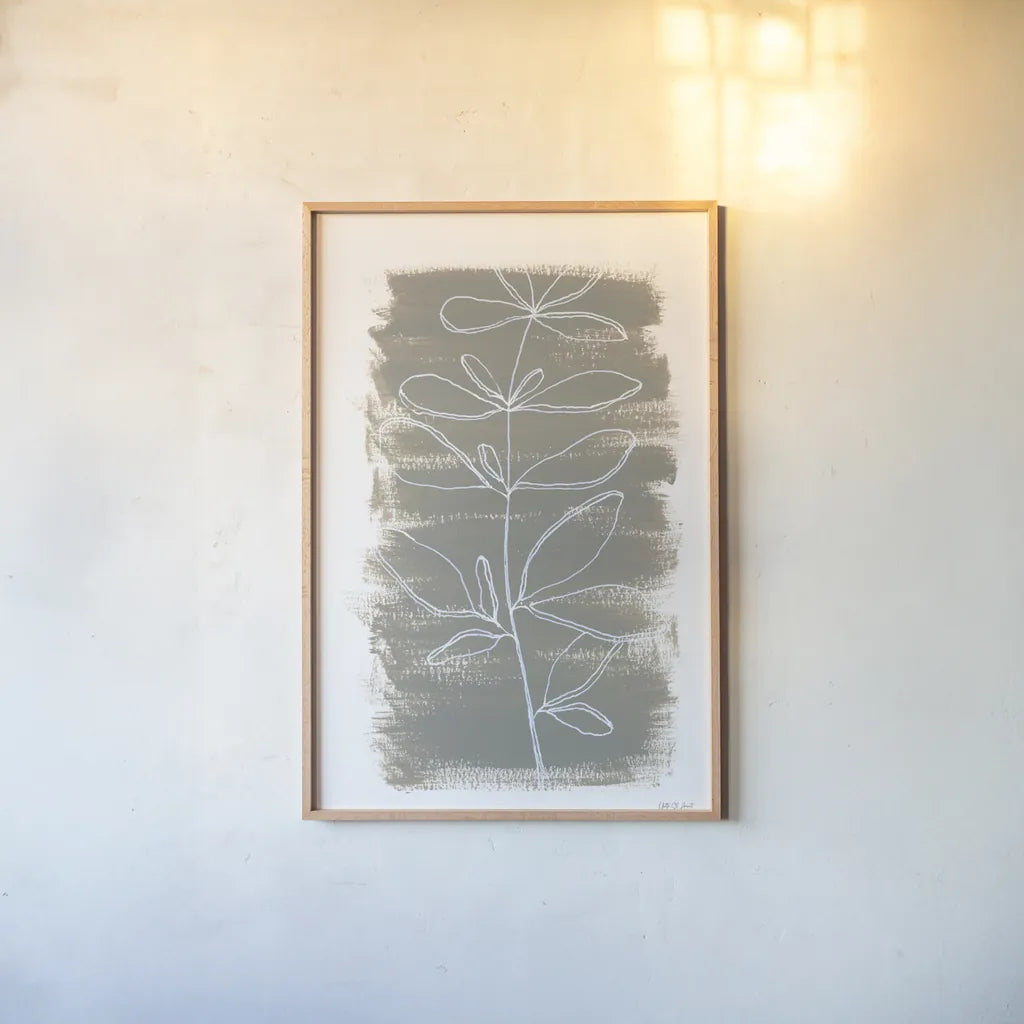 Simple Sprigs of Basil by Yvette St. Amant. shown as a paper print in a natural frame. Available as a archival giclee rolled canvas, fine art paper, or poster print. SKU 93602h.