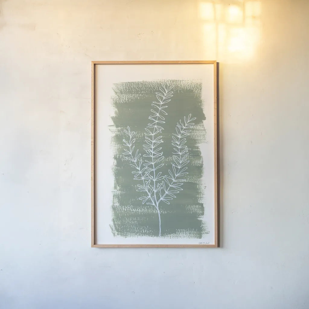 Simple Sprigs of Rosemary by Yvette St. Amant. shown as a paper print in a natural frame. Available as a archival giclee rolled canvas, fine art paper, or poster print. SKU 93601h.