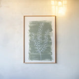 Simple Sprigs of Rosemary by Yvette St. Amant. shown as a paper print in a natural frame. Available as a archival giclee rolled canvas, fine art paper, or poster print. SKU 93601h.