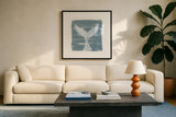 Soft Sea Whale Tail by Yvette St. Amant. Displayed in a glass frame with matte in a clean modern living room. Available as an archival giclee rolled canvas, fine art paper, or poster print. SKU 90000a.