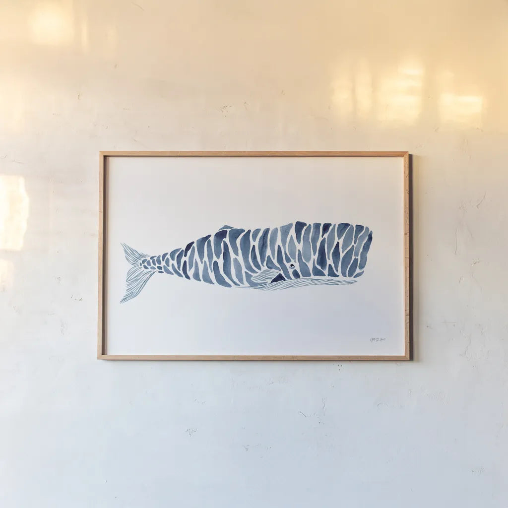 Sperm Whale by Yvette St. Amant. shown as a paper print in a natural frame. Available as a archival giclee rolled canvas, fine art paper, or poster print. SKU 90116i.