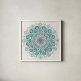 Spiral Mandala Green by Yvette St. Amant. Shown in a crisp white glass frame for a clean and minimalist style. Available as an archival giclee rolled canvas, fine art paper, or poster print. SKU 91002a.