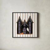 Spooky Gingerbread Manor I by Yvette St. Amant. Shown in a sleek black glass frame for a contemporary gallery look. Available as an archival giclee rolled canvas, fine art paper, or poster print. SKU 101109a.