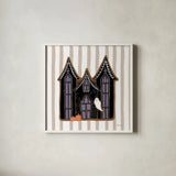 Spooky Gingerbread Manor I by Yvette St. Amant. Shown in a crisp white glass frame for a clean and minimalist style. Available as an archival giclee rolled canvas, fine art paper, or poster print. SKU 101109a.