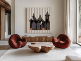 Spooky Gingerbread Manor II by Yvette St. Amant. Shown as extra-large giant wall art in a modern living room. Available as an archival giclee rolled canvas, fine art paper, or poster print. SKU 101110a.