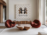 Spooky Gingerbread Manor III by Yvette St. Amant. Shown as extra-large giant wall art in a modern living room. Available as an archival giclee rolled canvas, fine art paper, or poster print. SKU 101111a.