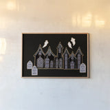 Spooky Gingerbread Manor V by Yvette St. Amant. shown as a paper print in a natural frame. Available as a archival giclee rolled canvas, fine art paper, or poster print. SKU 101113i.