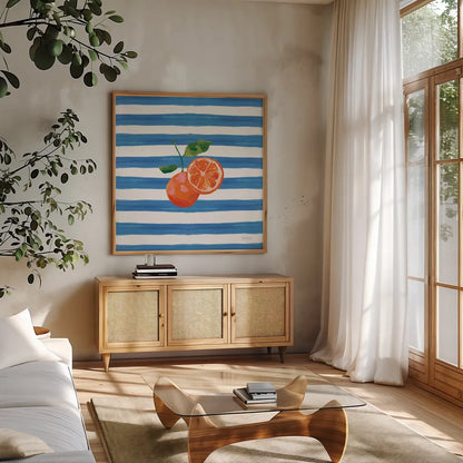 Summer in Stripes III by Yvette St. Amant. Shown in a natural wood frame in a cozy modern living room. Available as an archival giclee rolled canvas, fine art paper, or poster print. SKU 96191a.
