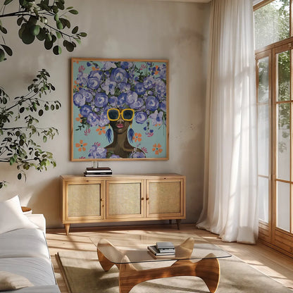 Sunning in Florals II by Yvette St. Amant. Shown in a natural wood frame in a cozy modern living room. Available as an archival giclee rolled canvas, fine art paper, or poster print. SKU 96180a.