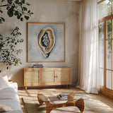 The World is Your Oyster II by Yvette St. Amant. Shown in a natural wood frame in a cozy modern living room. Available as an archival giclee rolled canvas, fine art paper, or poster print. SKU 88203a.