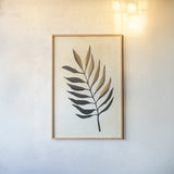 Tropical Leaf I by Yvette St. Amant. shown as a paper print in a natural frame. Available as a archival giclee rolled canvas, fine art paper, or poster print. SKU 88739h.