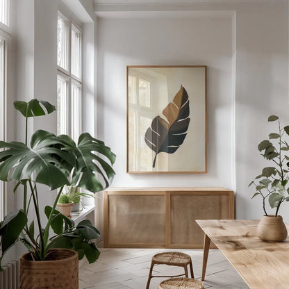 Tropical Leaf II by Yvette St. Amant. shown as a print in a natural wood frame in a dining room. Available as a archival giclee rolled canvas, fine art paper, or poster print. SKU 88740h.
