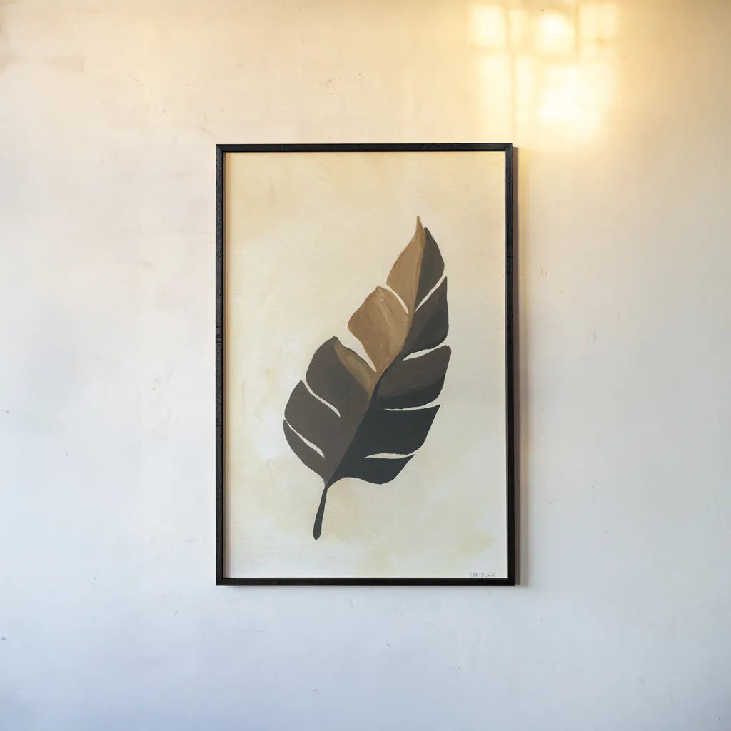 Tropical Leaf II by Yvette St. Amant. shown as a paper print in a black flame. Available as a archival giclee rolled canvas, fine art paper, or poster print. SKU 88740h.