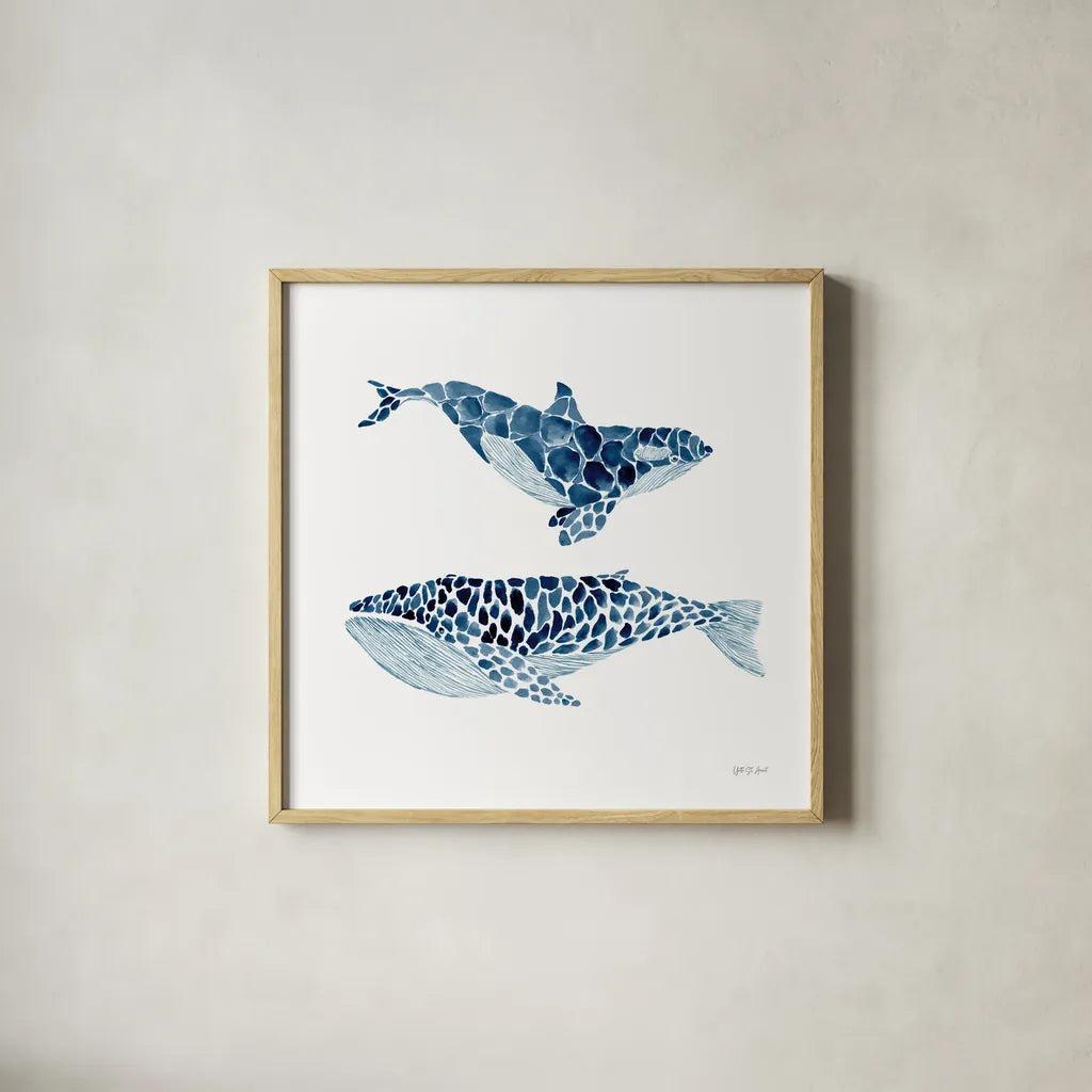 Two Whales by Yvette St. Amant. Shown in a natural wood glass frame for a timeless modern aesthetic. Available as an archival giclee rolled canvas, fine art paper, or poster print. SKU 90119a.