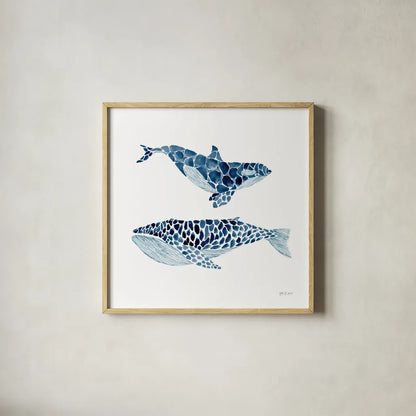 Two Whales by Yvette St. Amant. Shown in a natural wood glass frame for a timeless modern aesthetic. Available as an archival giclee rolled canvas, fine art paper, or poster print. SKU 90119a.
