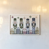 Vintage Nutcrackers I by Yvette St. Amant. shown as a paper print in a white frame. Available as a archival giclee rolled canvas, fine art paper, or poster print. SKU 94711i.