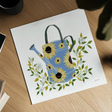 Watering Can with Daisies by Yvette St. Amant. Shown as a detailed flat fine art print, highlighting archival giclee quality. Available as an archival giclee rolled canvas, fine art paper, or poster print. SKU 101178a.