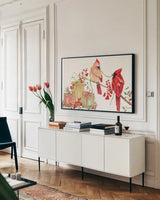 Winterberry Tidings V by Yvette St. Amant. shown as a framed stretched canvas in a living room above a console. Available as a archival giclee rolled canvas, fine art paper, or poster print. SKU 101226i.